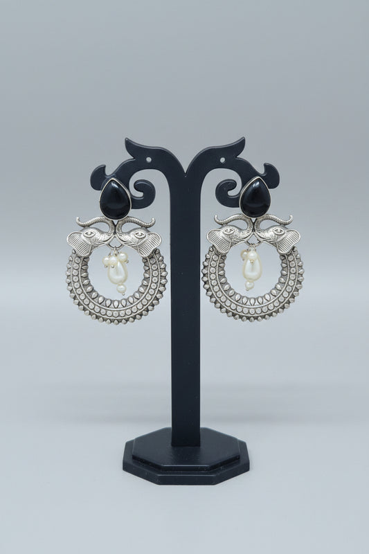 Pair of oxidised Chandbali earrings with black stones and pearls and elephant motif