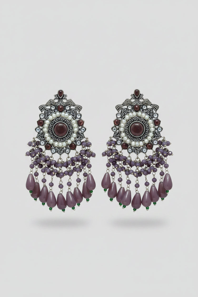 Premium Oxidised party and festival silver dangler earrings with purple colored beads and pearls 