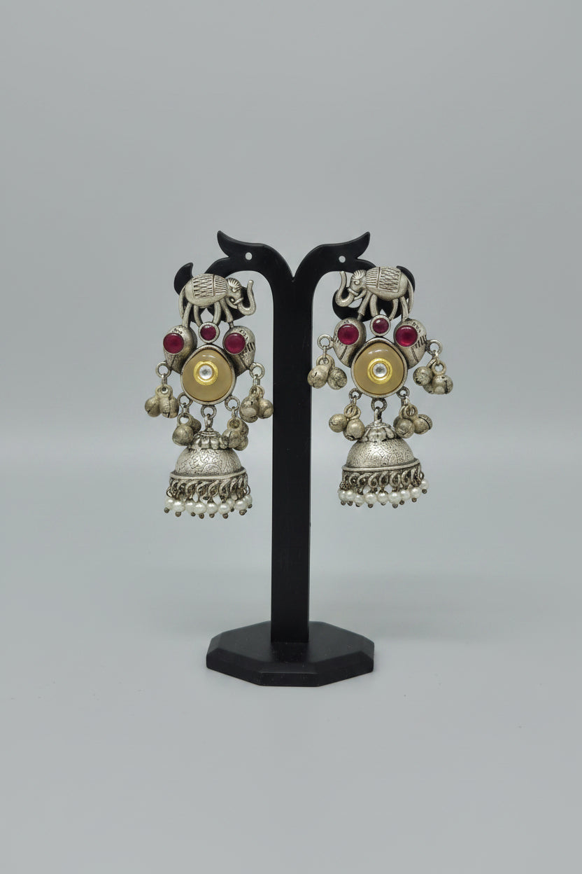 Premium  oxidized silver jhumki earrings with an elephant motif and peach  stone