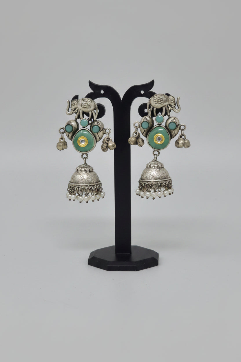 Premium  oxidized silver jhumki earrings with an elephant motif and cool mint  stone