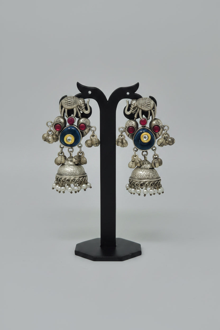 Premium  oxidized silver jhumki earrings with an elephant motif and blue  stone