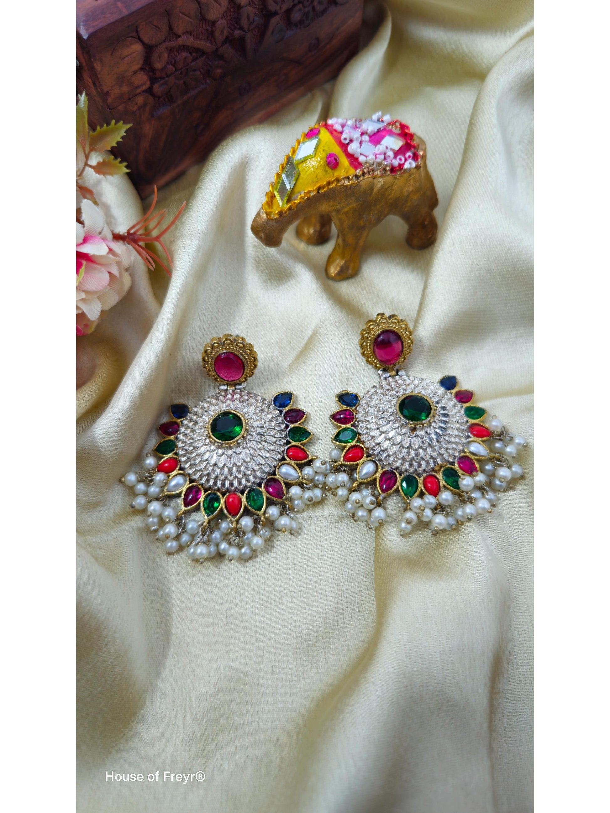 Oxidised earrings with colorful gemstones of a necklace set