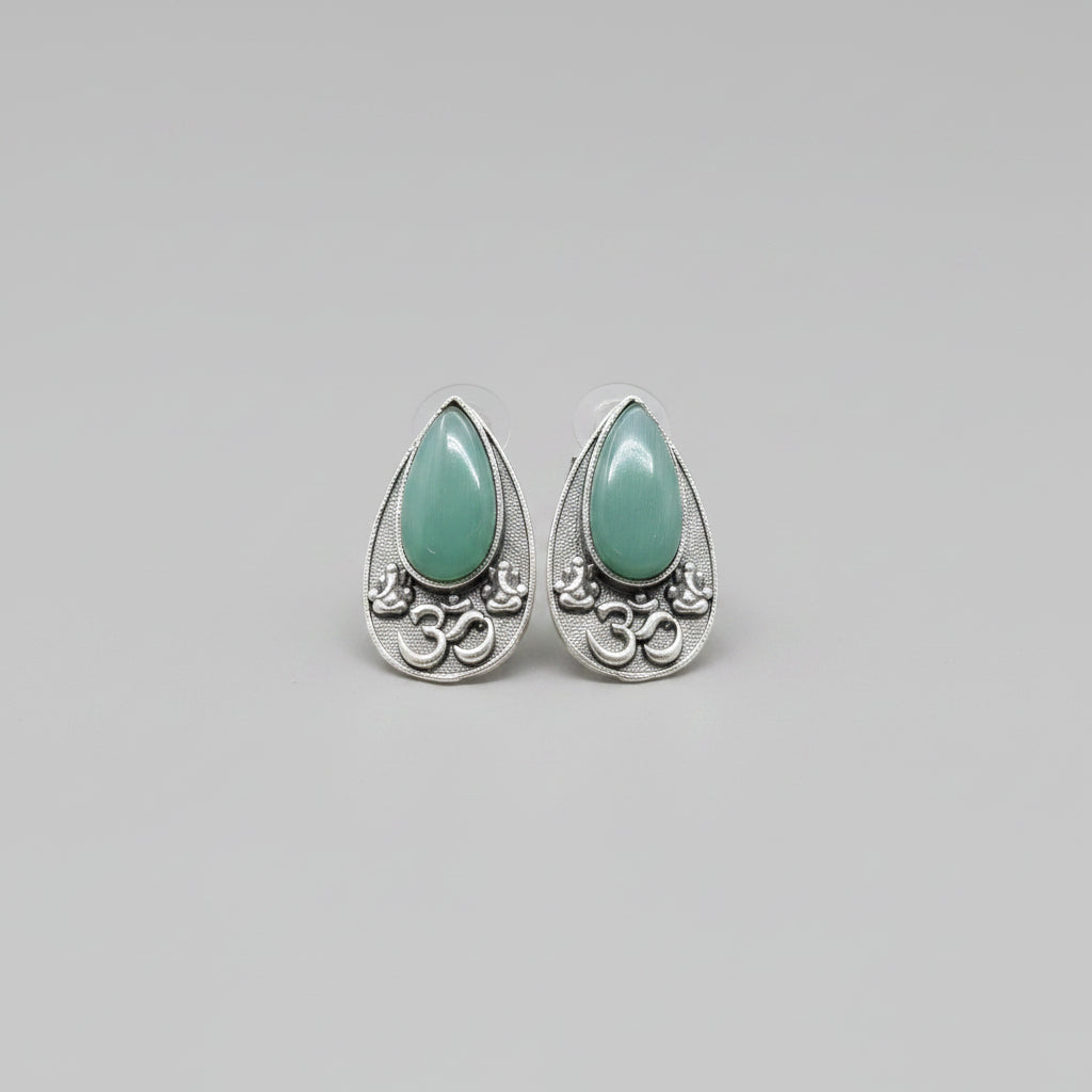 Premium oxidised silver OM teardrop stud earrings with cool mint stone.