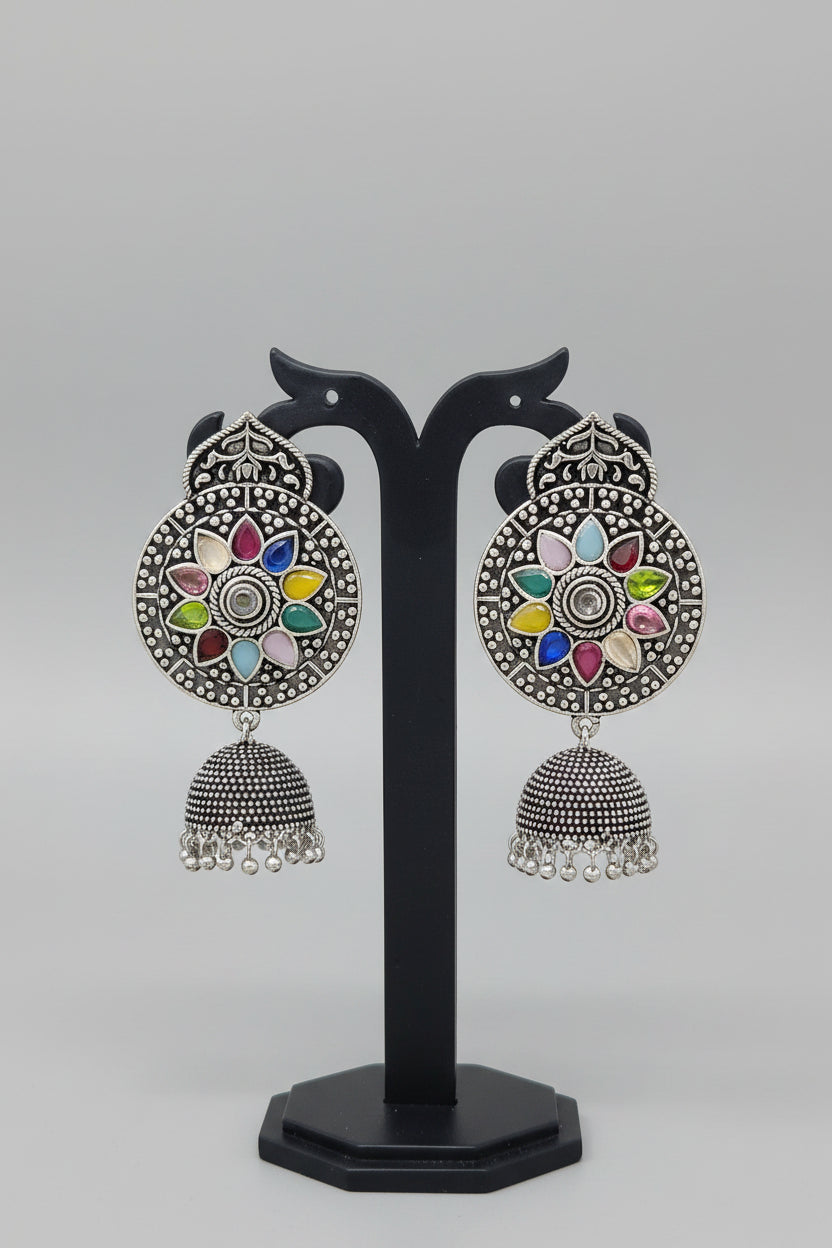 Premium oxidised handmade Ornate earrings with navratna stones and silver design.