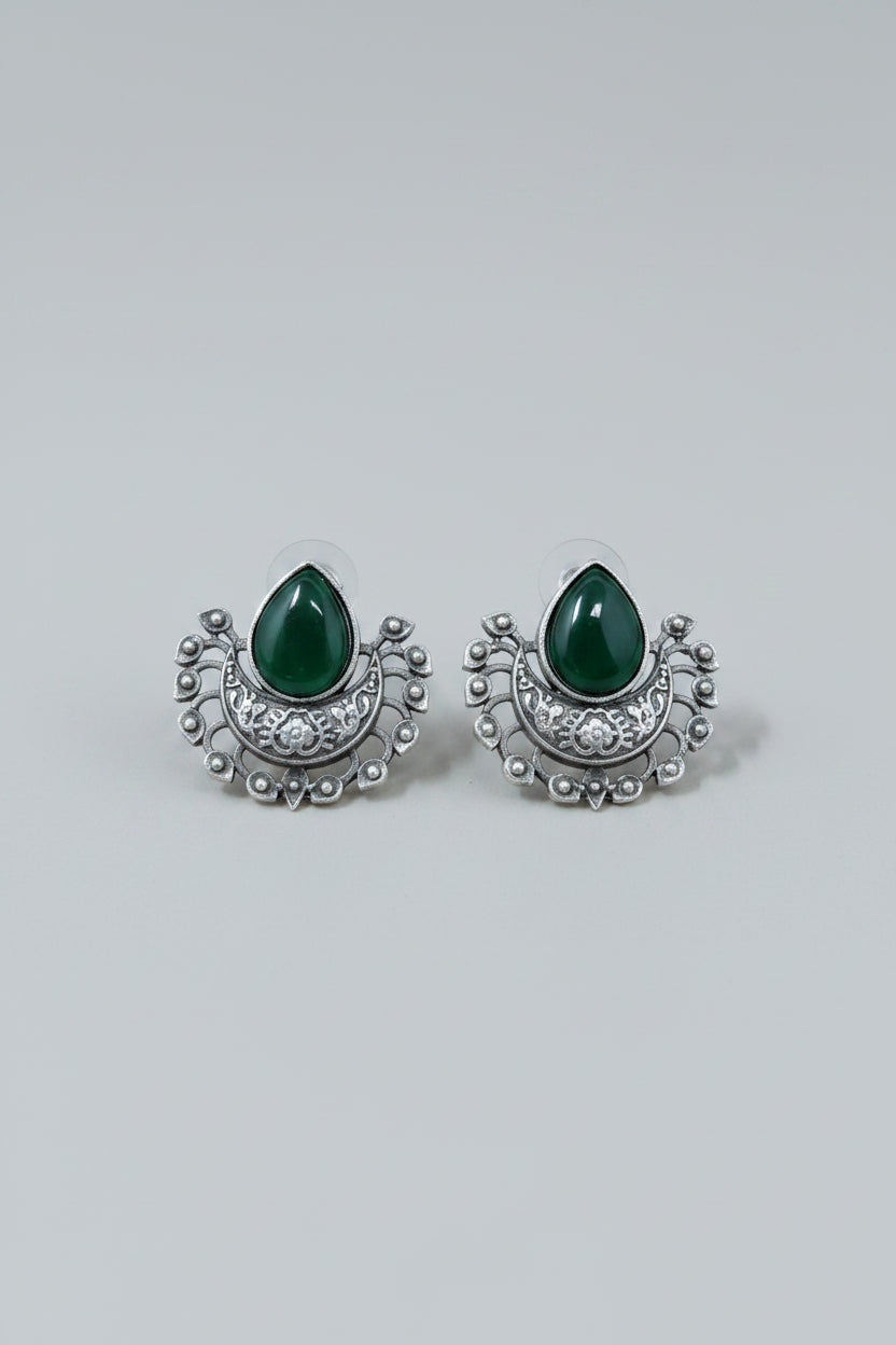 Oxidised silver stud earrings with teardrop green gemstones.