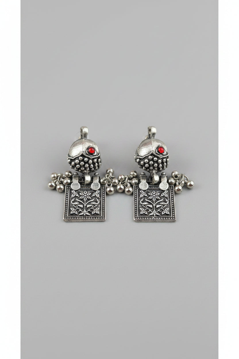 Silver oxidised earrings with red stones