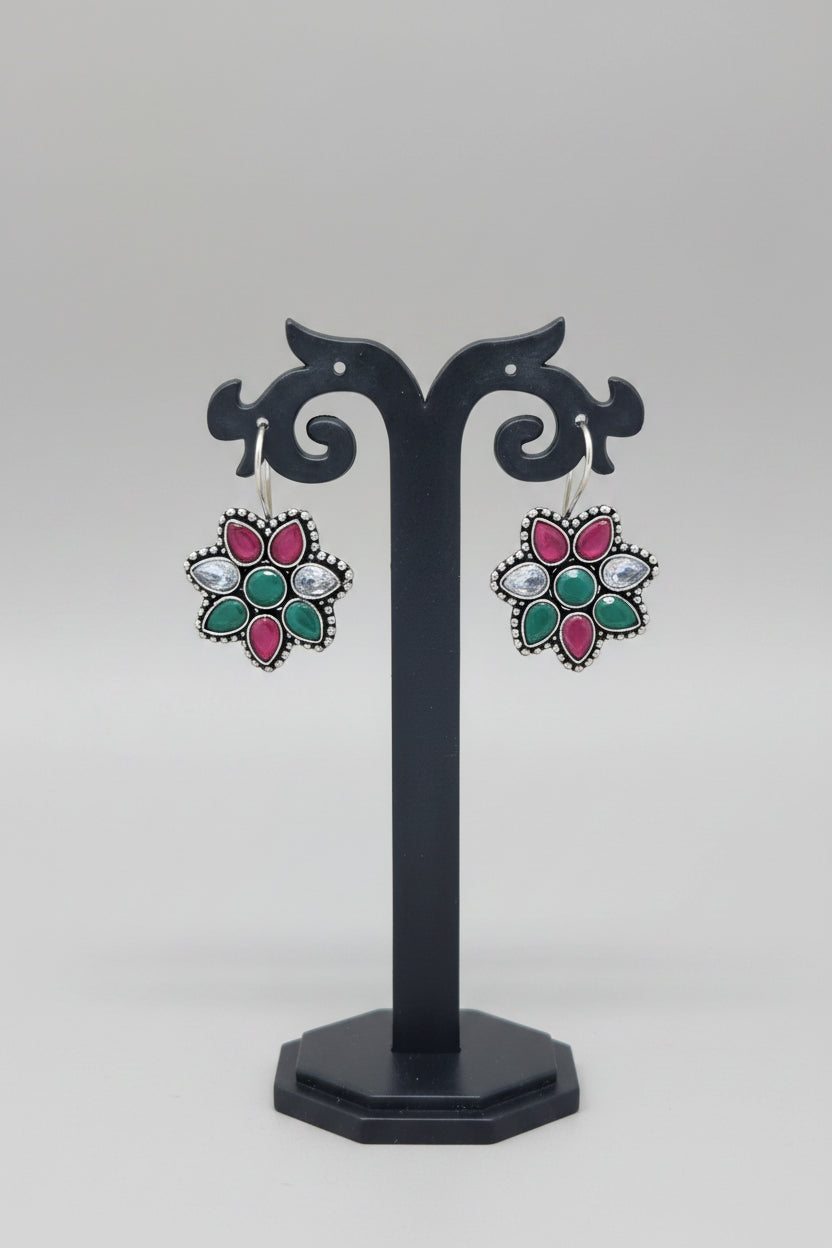 Pair of premium oxidised floral earrings with multicolor moissanite gemstones