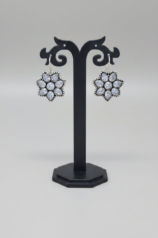 Pair of premium oxidised floral earrings with white moissanite gemstones