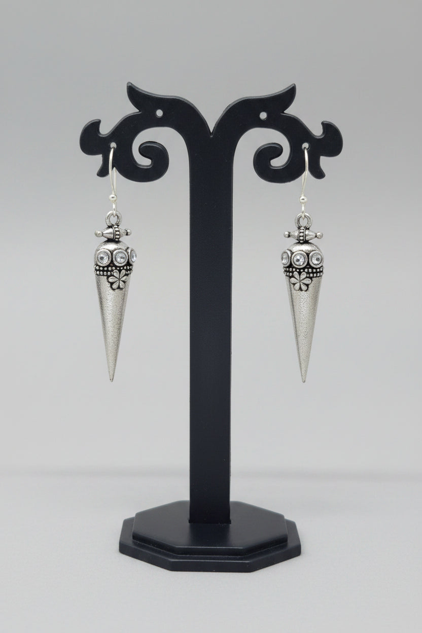 premium oxidised cone-shaped oxidized silver earrings with tribal-inspired detailing and white stone accents