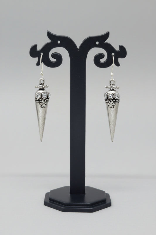 premium oxidised cone-shaped oxidized silver earrings with tribal-inspired detailing and white stone accents