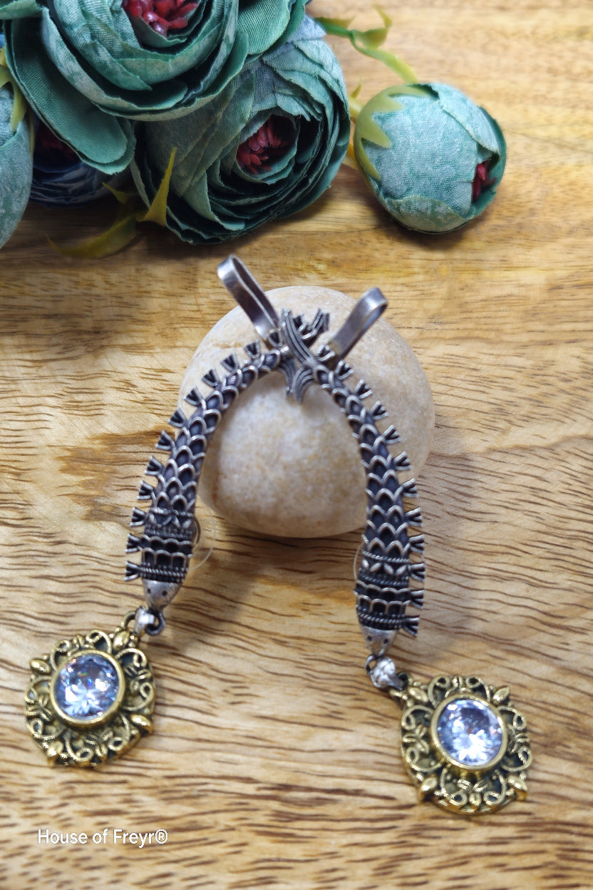 Antique oxidised silver ear cuffs with moissanite semi-precious stone accents and intricate fish motif carvings.