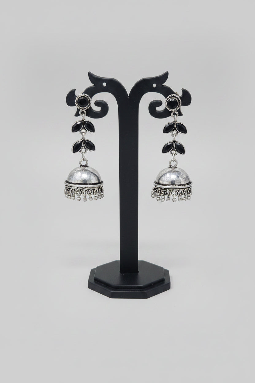 Premium oxidised handmade Silver jhumki earrings with black stones.