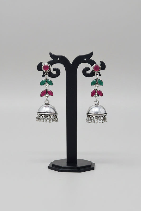 Premium oxidised handmade Silver jhumki earrings with multicolor stones.