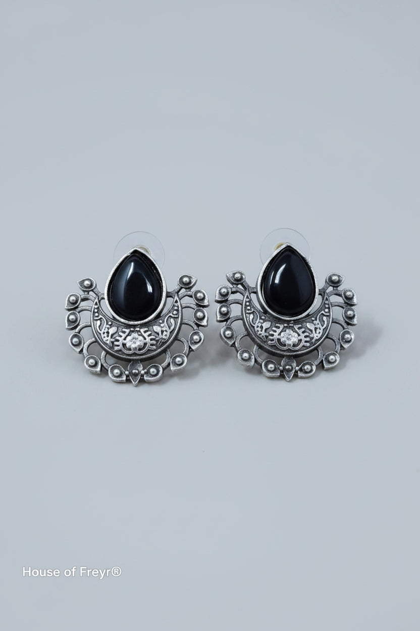 Oxidised silver stud earrings with teardrop black gemstones.