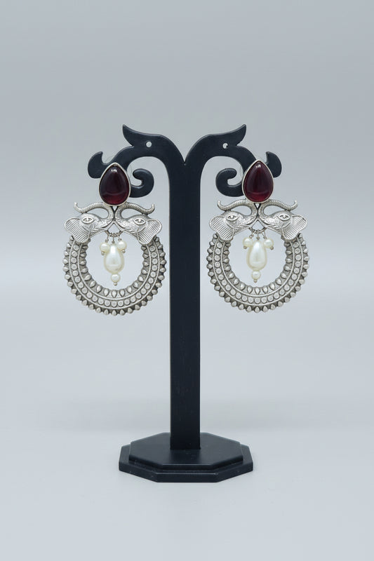 Pair of oxidised Chandbali earrings with red stones and pearls and elephant motif
