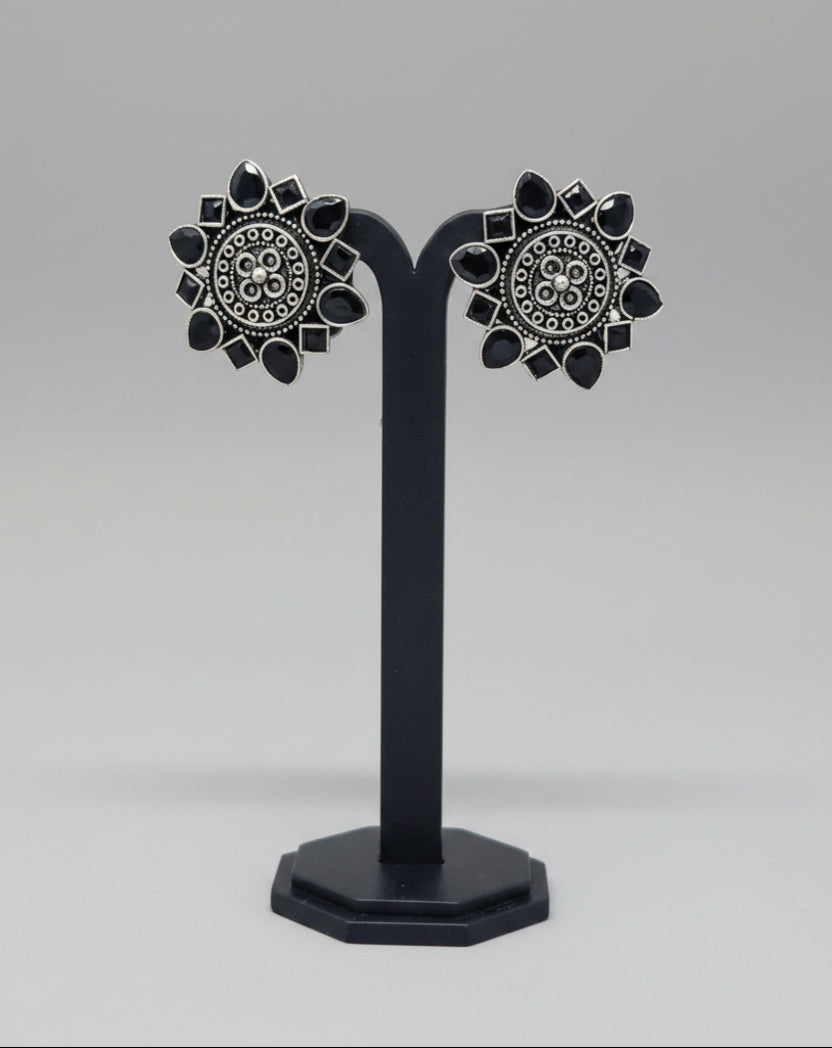 Pair of oxidised floral stud earrings with black gemstone