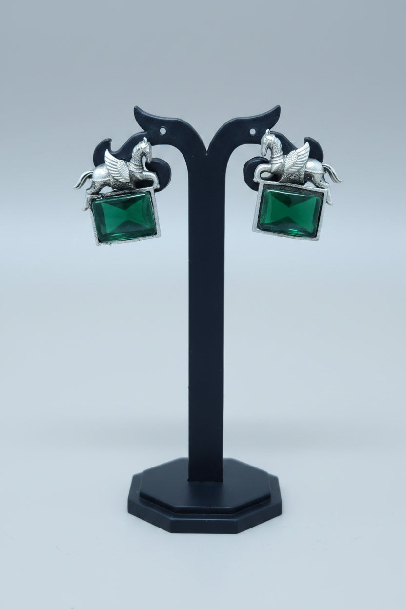 oxidised lucky horse earring with green gemstone