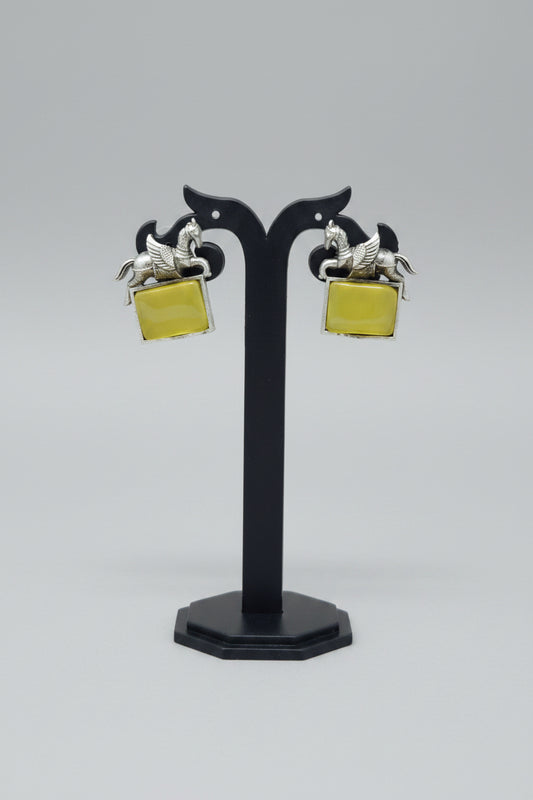 oxidised lucky horse earring with yellow gemstone