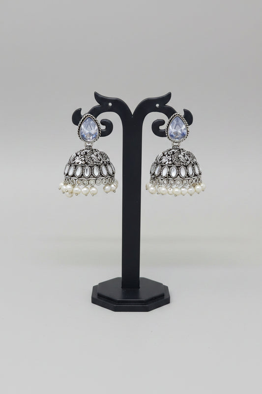 Pair of silver oxidised jhumki earrings with pearls and white moissanite stone