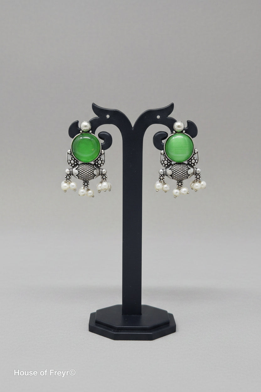 pair of antique oxidised stud earring with green gemstone