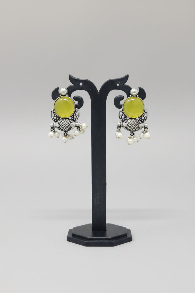 pair of antique oxidised stud earring with yellow gemstone