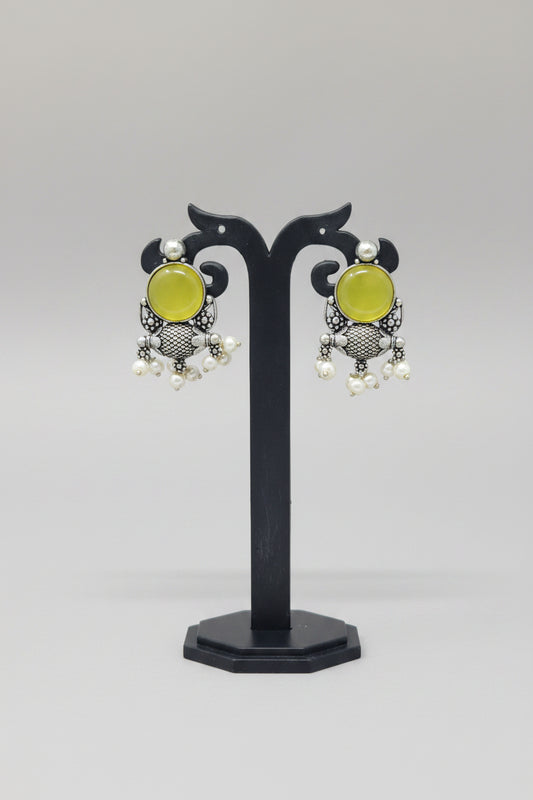 pair of antique oxidised stud earring with yellow gemstone