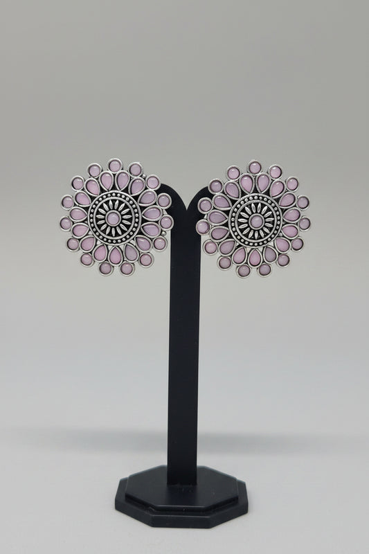 Antique oxidised Silver Sunburst Stud Earrings with intricate oxidized silver work, pink semi-precious stones in a teardrop and circular setting.