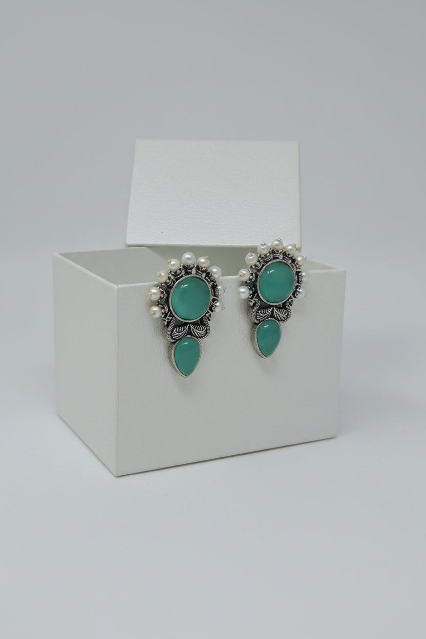 Pair of vintage oxidised stud earrings with cool blue colored stones
